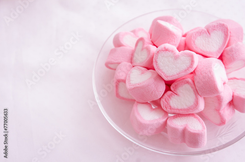 Pink heart marshmallow  in glass dish © lalalululala