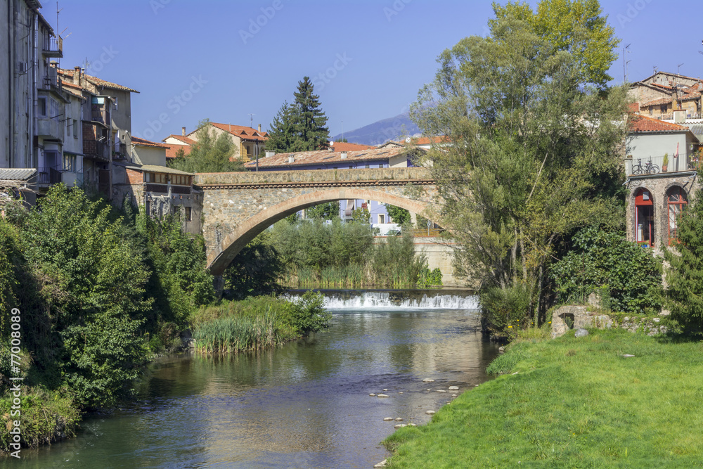 Landscape river bridge in the village of Ripoll