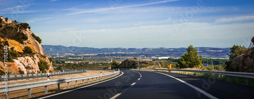 Billede på lærred Highway scenes go by as we make our way to Barcelona.