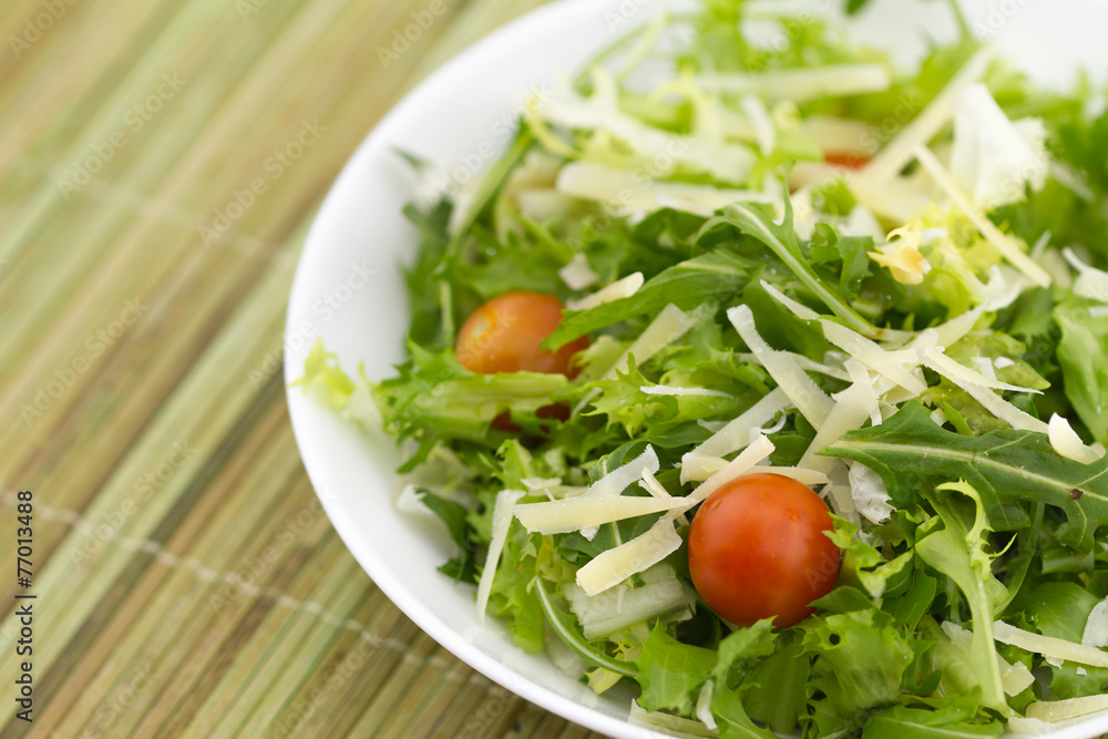 Green Salad on bamboo background Green Salad on bamboo background