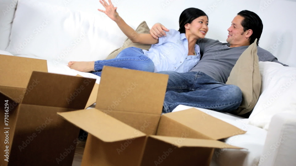 Young Asian Chinese Couple Sofa Making Plans New Home Young Asian Chinese Couple Sofa Making Plans New Home