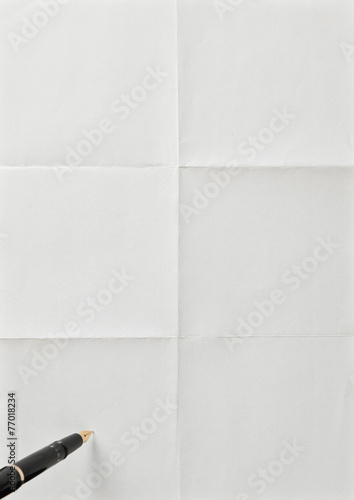 pen and white sheet of paper