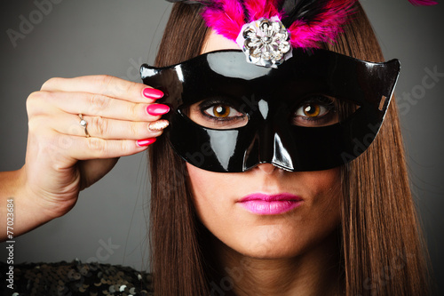 Woman in carnival mask.