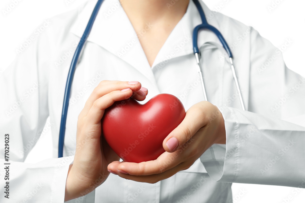 Close-up of doctor hands with heart Close-up of doctor hands with heart