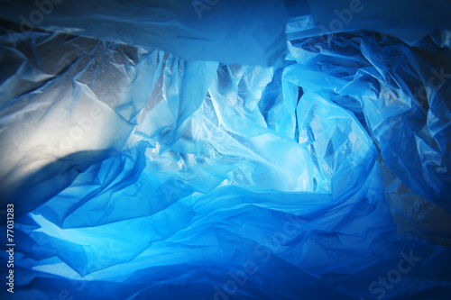 Abstract background of the insides of a blue plastic bag