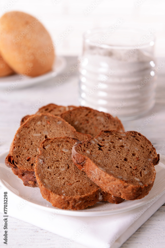 Tasty bread on table on light background Tasty bread on table on light background