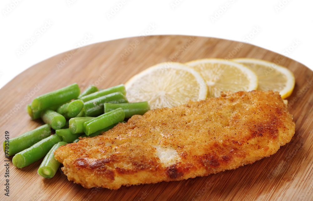 Breaded fried fish fillet and potatoes with asparagus and Breaded fried fish fillet and potatoes with asparagus and