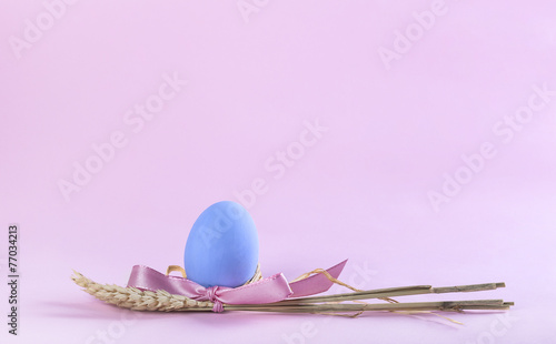 Easter blue painted egg with sheaf of wheat greeting card