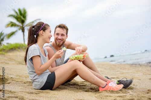 Salad - healthy fitness couple eating food