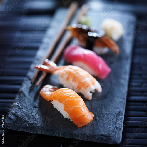 assorted sushi nigiri on slate