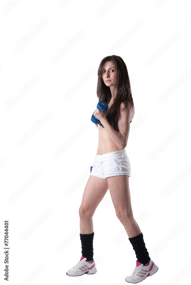 Young athletic woman holding a dumbbells Young athletic woman holding a dumbbells