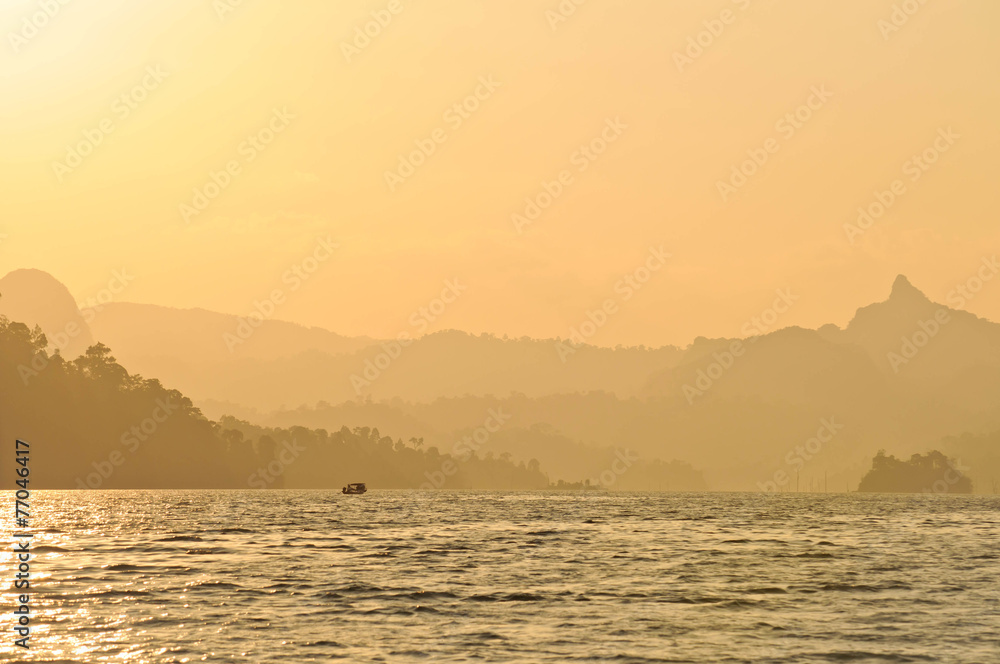 Sunset at lake,Khao Sok National Park, Mountain and Lake in Sout