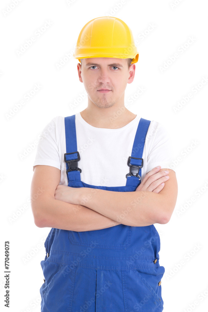 portrait of young handsome man in blue builder uniform isolated portrait of young handsome man in blue builder uniform isolated