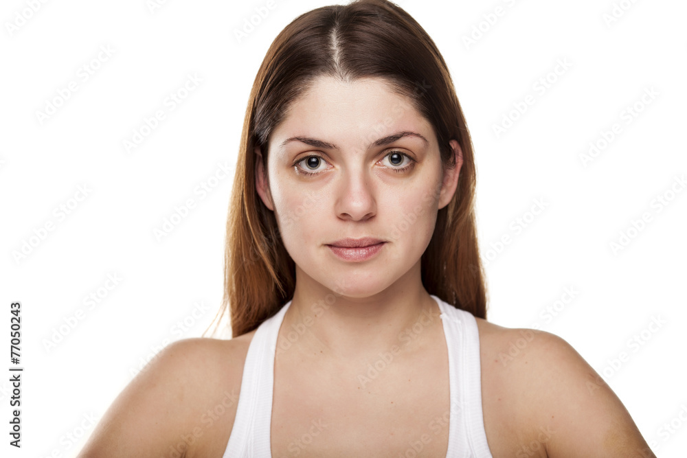 young woman without make-up on white background young woman without make-up on white background