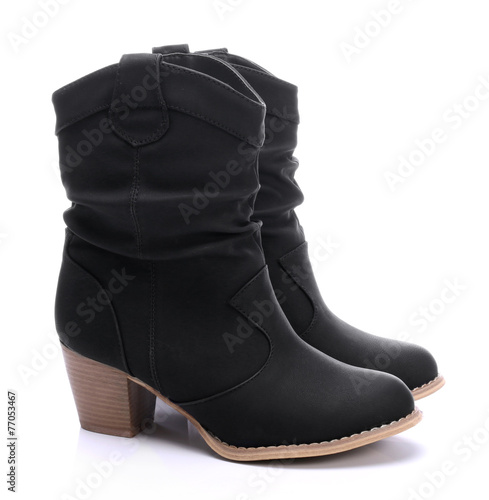 Women's black shoes on a wh...