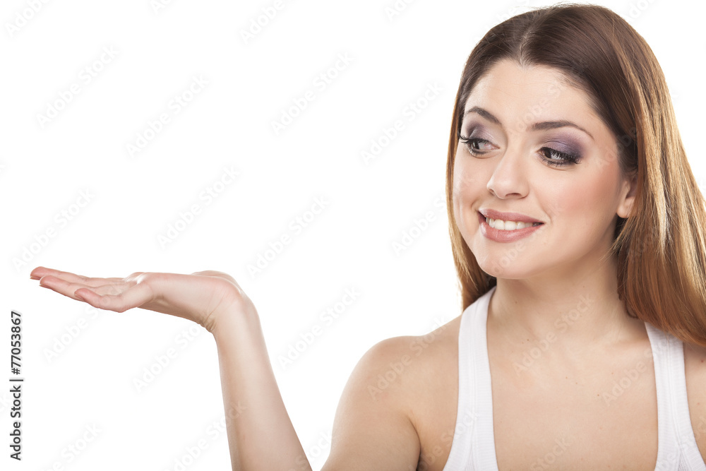 positive woman holding an imaginary object on a white background positive woman holding an imaginary object on a white background