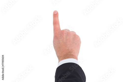 Businessman in suit pointing with his finger