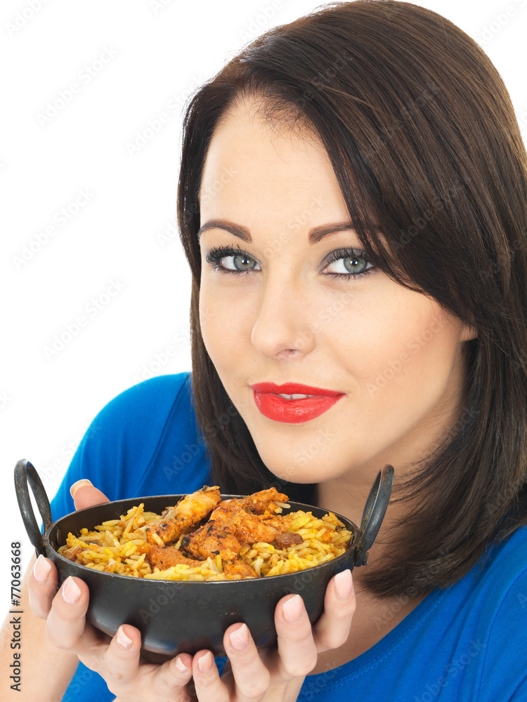 Young Woman Eating Chicken Tikka Biryani Young Woman Eating Chicken Tikka Biryani