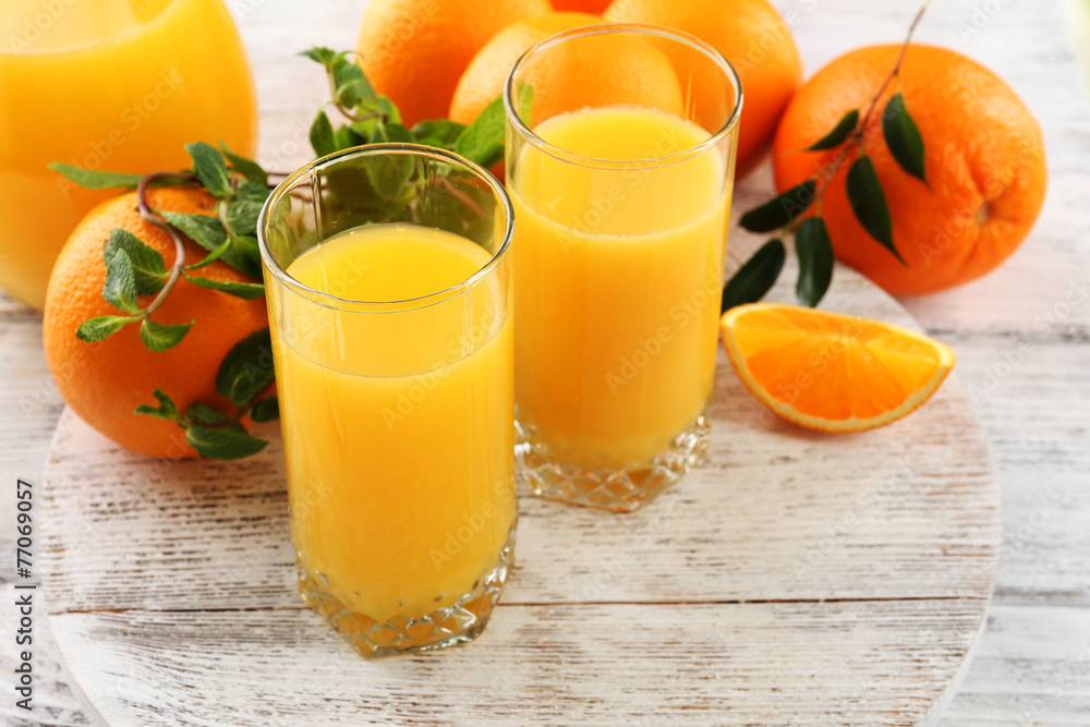 Glass of orange juice and oranges Glass of orange juice and oranges