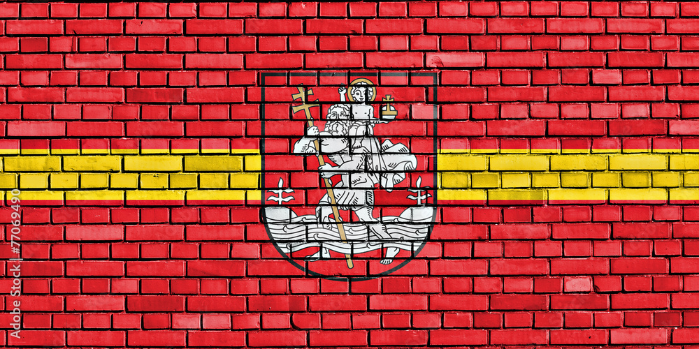 flag of Vilnius painted on brick wall