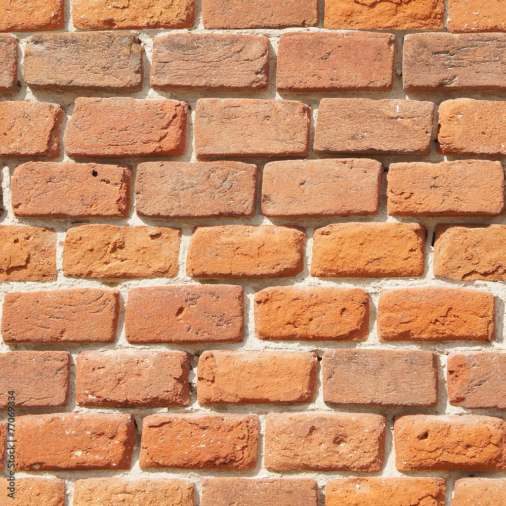 Fototapeta premium The old red brick masonry. Seamless texture