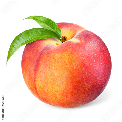 Peach with leaves isolated on white