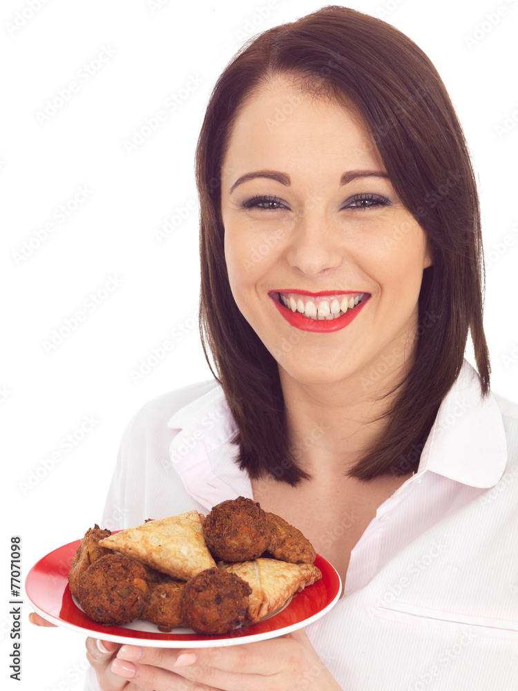 Woman Holding a Plate of Indian Style Snacks Woman Holding a Plate of Indian Style Snacks