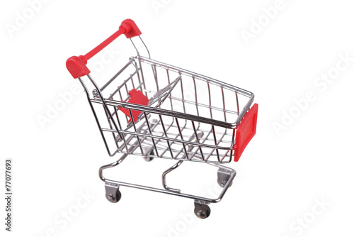 Small shopping cart isolated on white © lexmomot