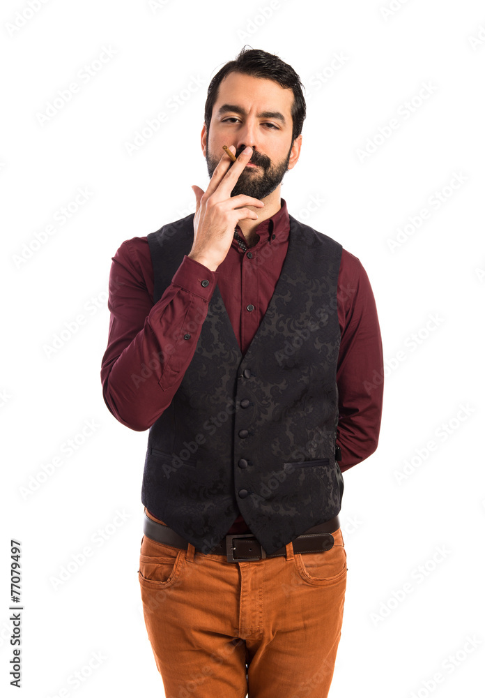 Man wearing waistcoat smoking Man wearing waistcoat smoking