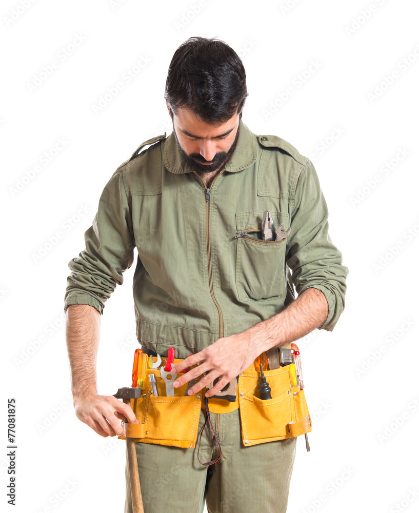 mechanic over white background mechanic over white background