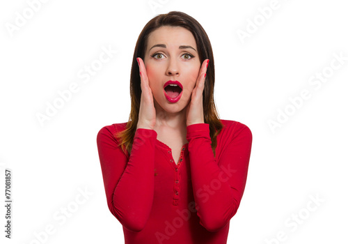 Stunned woman in red long sleeve open mouth in awe looking isola