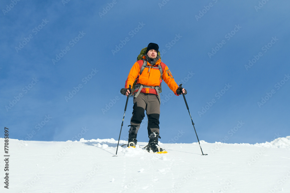 Winter hiking in snowshoes.