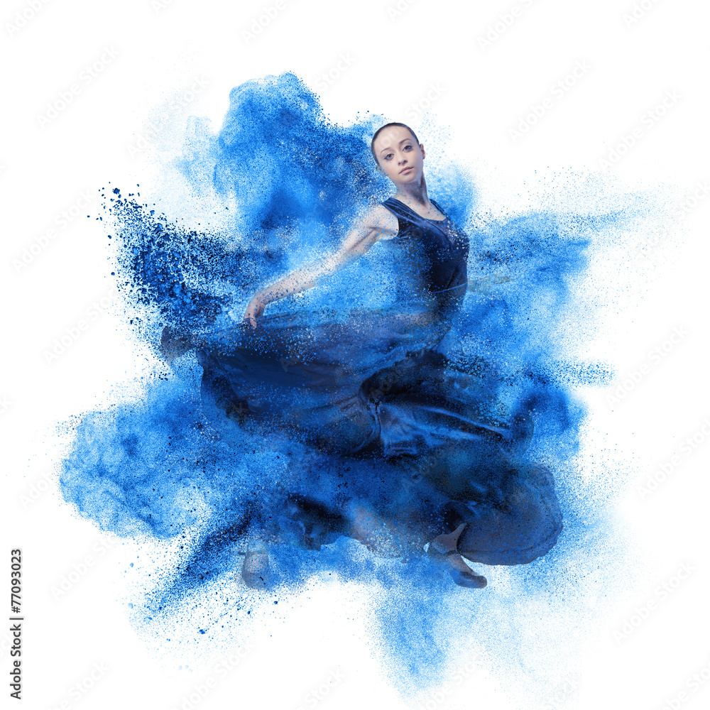 Obraz premium young woman dancing flamenco against explosion