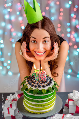 Girl with happy birthday cake photo