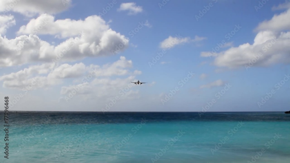 Landing approach of passenger plane. Philipsburg, Saint-Martin Landing approach of passenger plane. Philipsburg, Saint-Martin