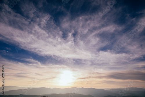 sky with clouds and sun