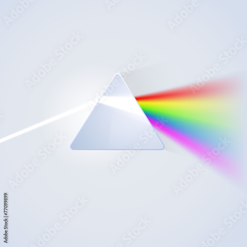 Glass prism on light background photo