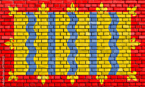 flag of Cambridgeshire painted on brick wall