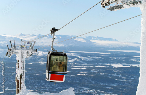 Ski lift on the way to the top photo