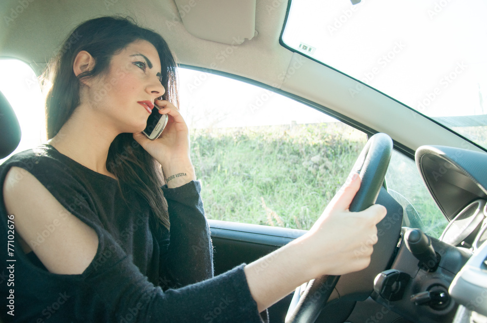 Fototapeta premium female driver with his smart phone