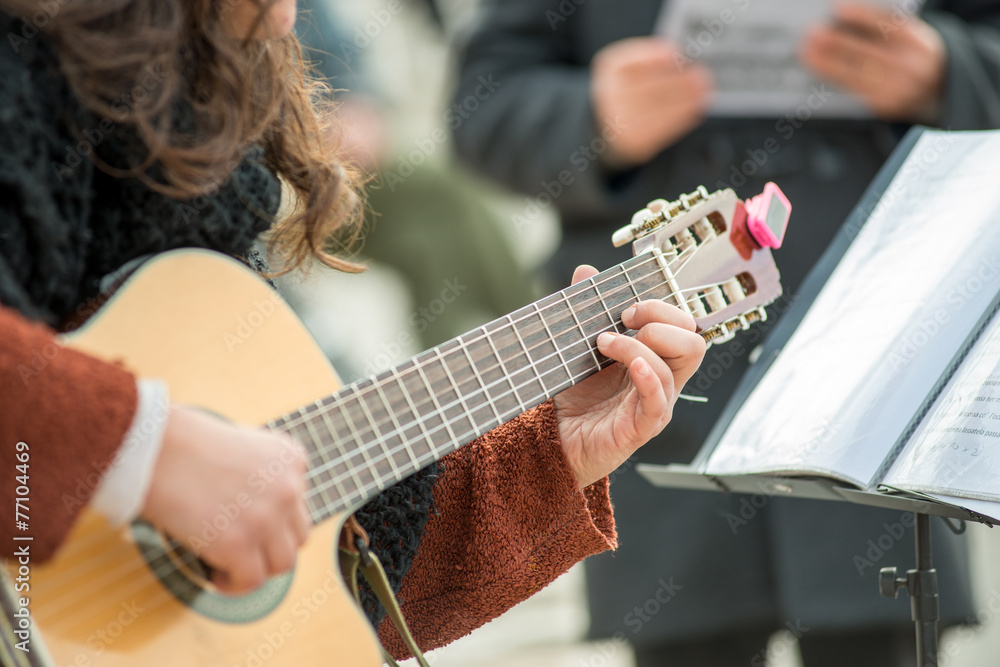 Fototapeta premium woman playing guitar