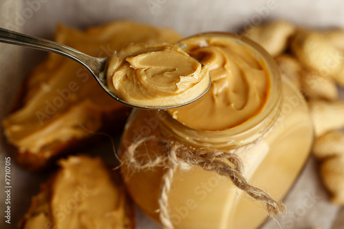 Fresh peanut butter in jar  close up