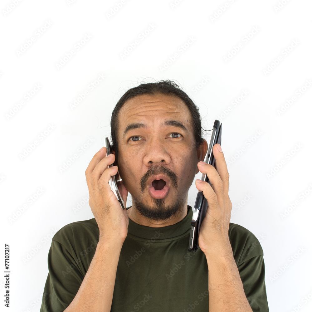 Old asian man using tablet-pc on white background. Old asian man using tablet-pc on white background.