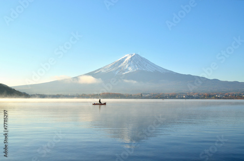 Boat and mount fuji in the morning at kawaguchiko lake japan photo