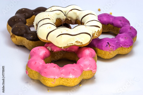 Variery of fresh donuts on white background