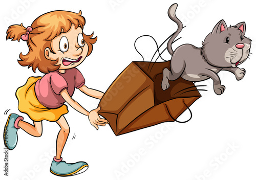A young girl chasing the cat
