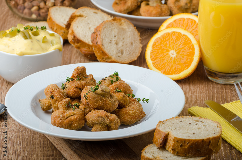 Breaded fried mushrooms with juice Breaded fried mushrooms with juice