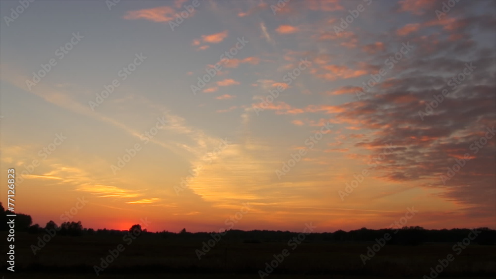 Sunset over a field in autumn. Time lapse. Sunset over a field in autumn. Time lapse.