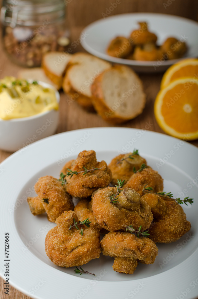 Breaded fried mushrooms with juice Breaded fried mushrooms with juice