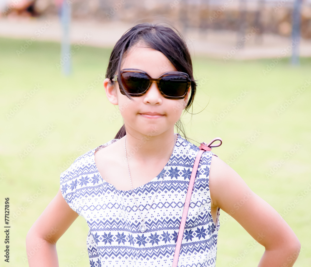 young girl wear glasses look at camera young girl wear glasses look at camera